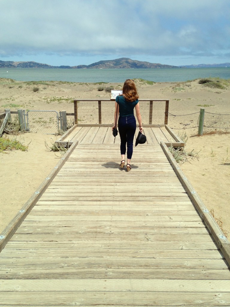 High-waisted pants and crop top combo.