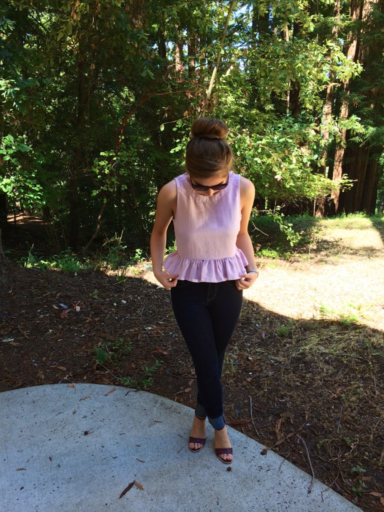 Levis jeans, red heels, sunglasses, pink peplum top