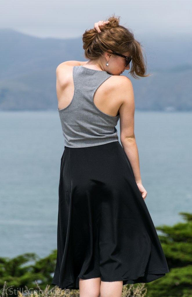 Black and White striped crop top, Black high wasted long skirt, Black Strappy Heels, Big Sunglasses, Wavy Hair