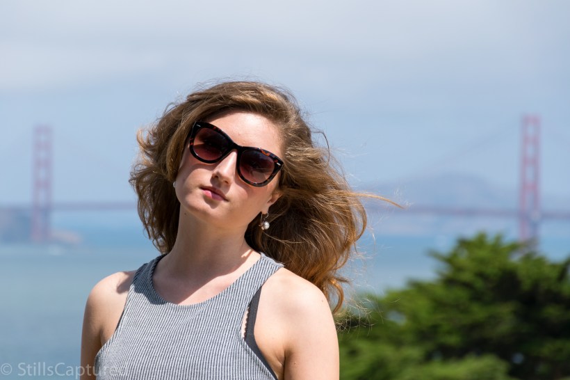 Black and White striped crop top, Black high wasted long skirt, Black Strappy Heels, Big Sunglasses, Wavy Hair