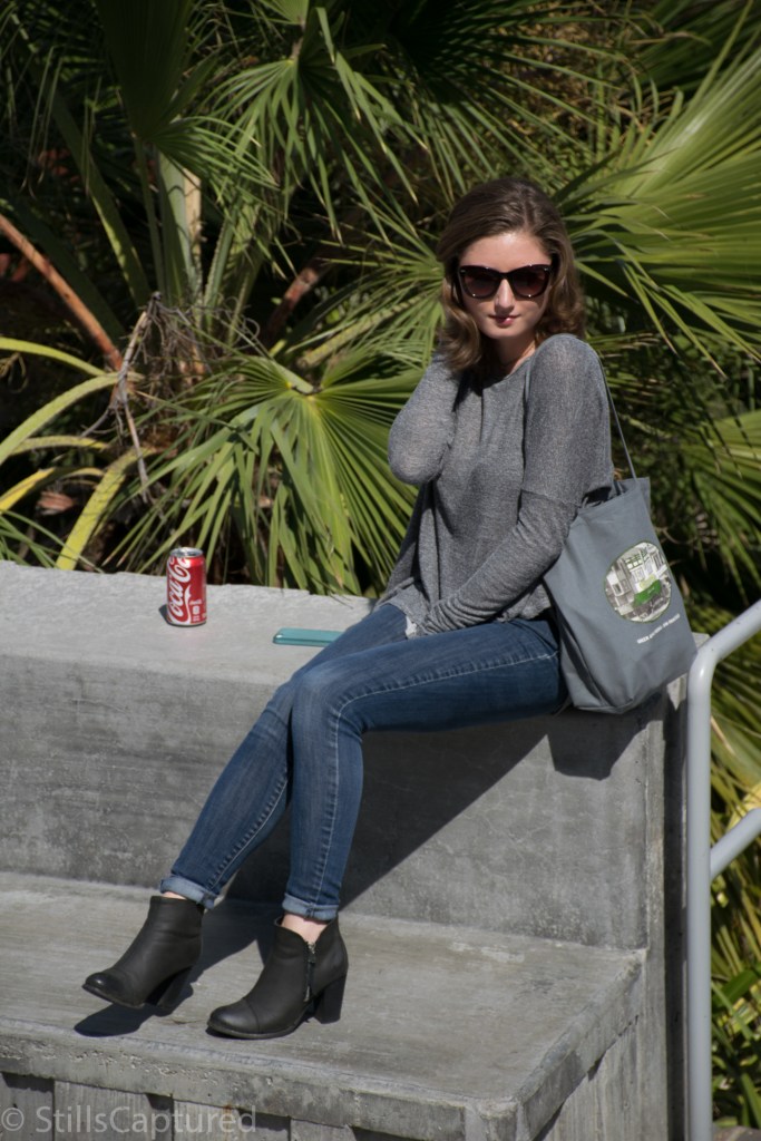 Oversized grey sweater, Cuffed Skinny Jeans, Black Booties, Sunglasses