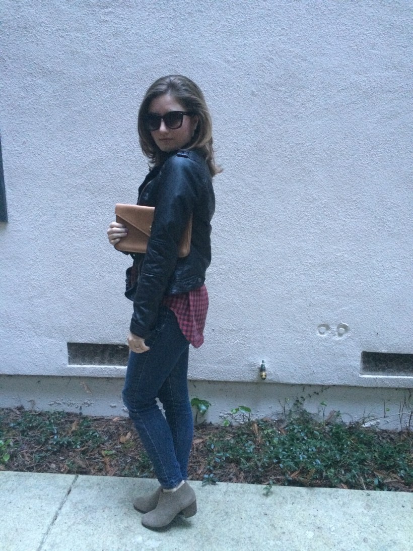 Leather clutch, leather jacket, flannel, skinny jeans, booties