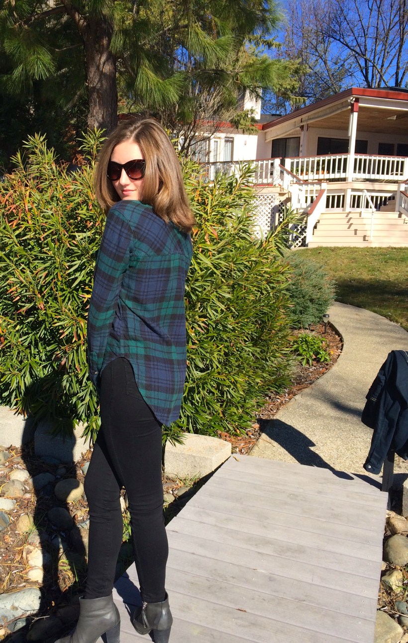 blue and green flannel, black jeans, booties