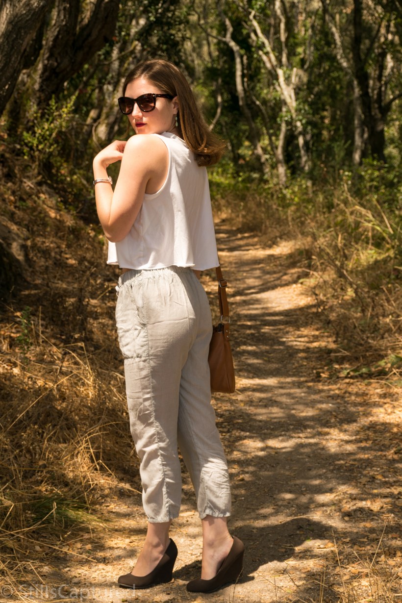 Urban Outfitters loose fitting tank top and pants, cross body purse, nordstrom sunnies, wedge pumps 