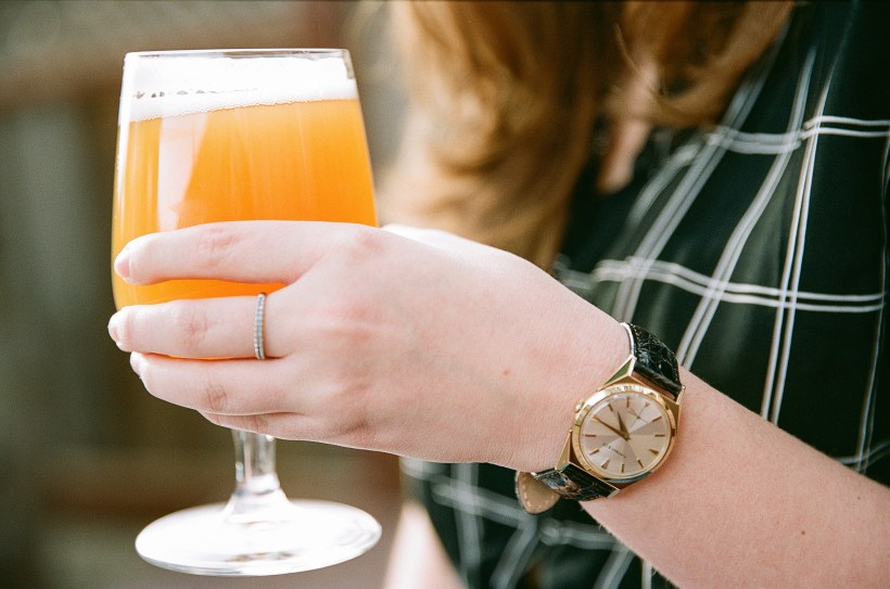 beer in woman's hand, picture