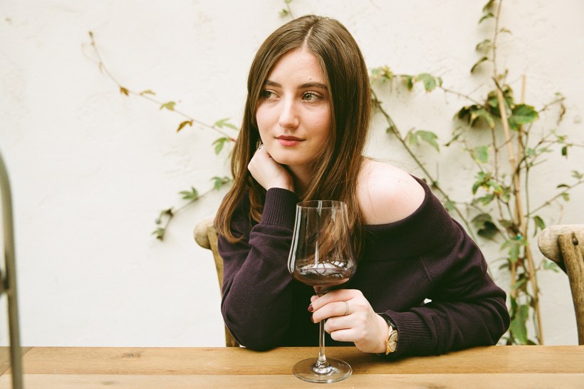 woman sipping wine, picture